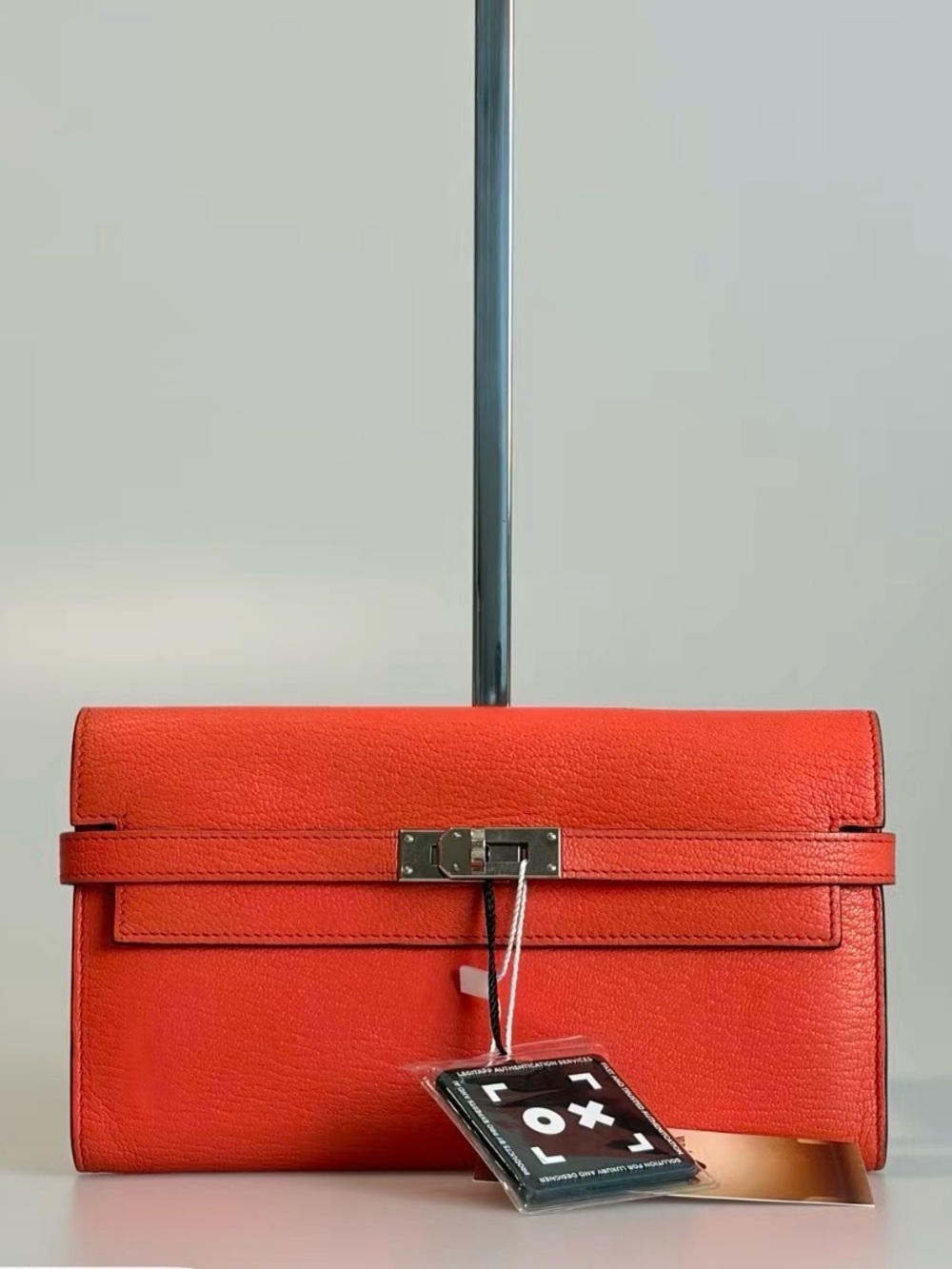 Hermes Kelly Orange-Red Togo Leather wallet  with Silver Hardware